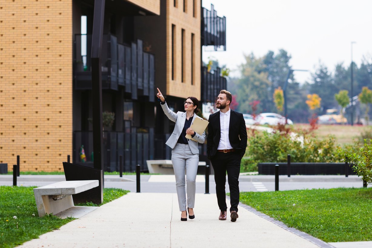 A female real estate agent showing properties